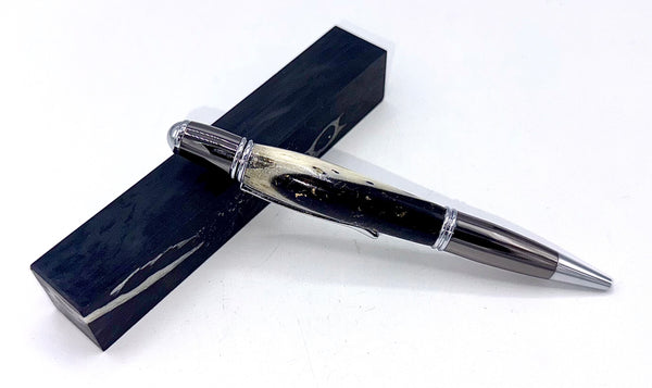 Hand-turned black acrylic and bone pen by STICS and STONES, showing the detailed craftsmanship and elegant design.
