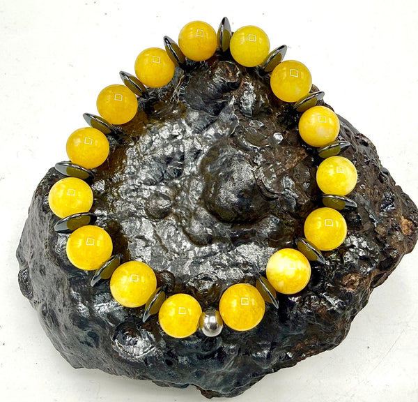 Yellow Jade Quartz and Hematite bracelet featuring vibrant yellow stones and sleek hematite accents, crafted by STICS and STONES.